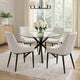 Dining room with a monza round glass dining table and four gray chairs.